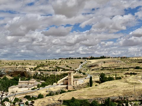a landscape with buildings and trees
