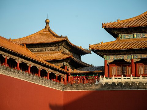 red and white temple under blue sky during daytime