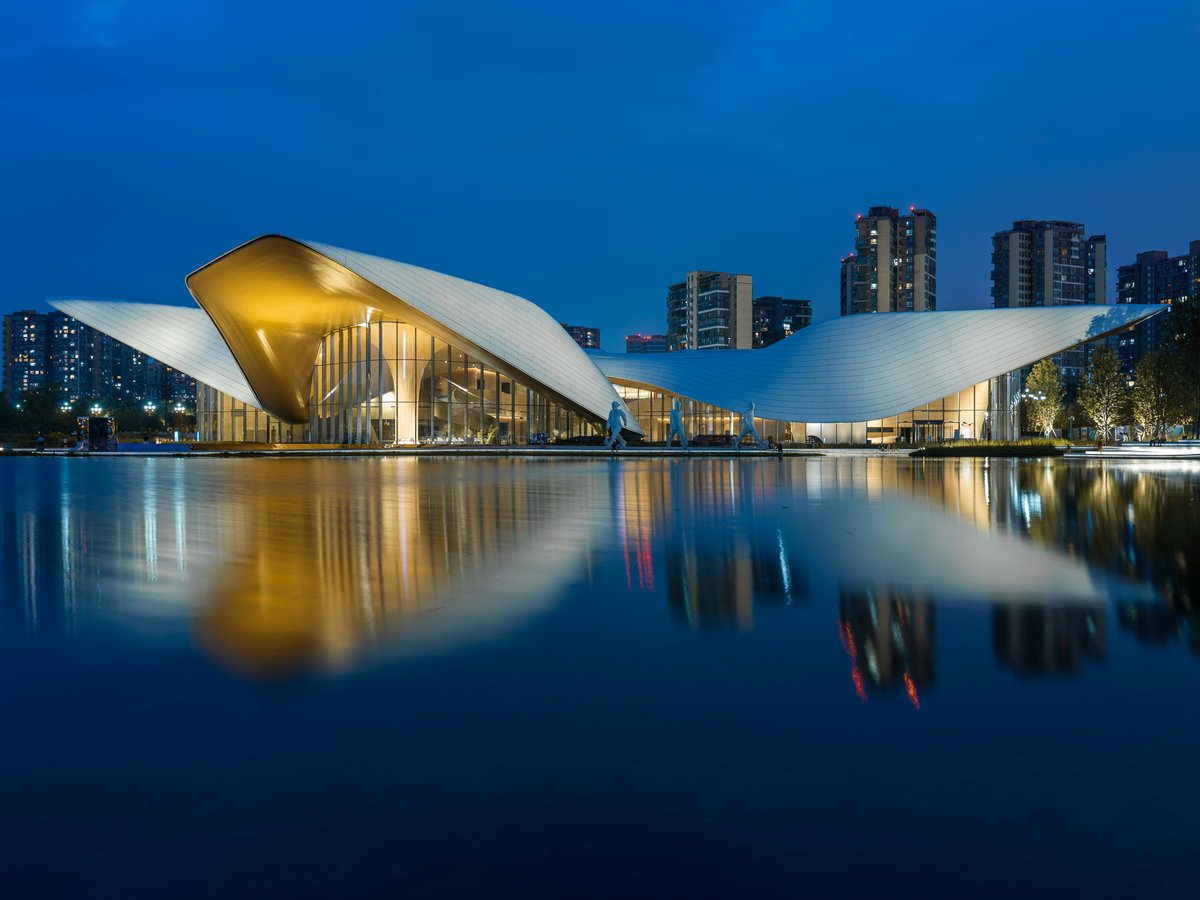 a building with a curved roof