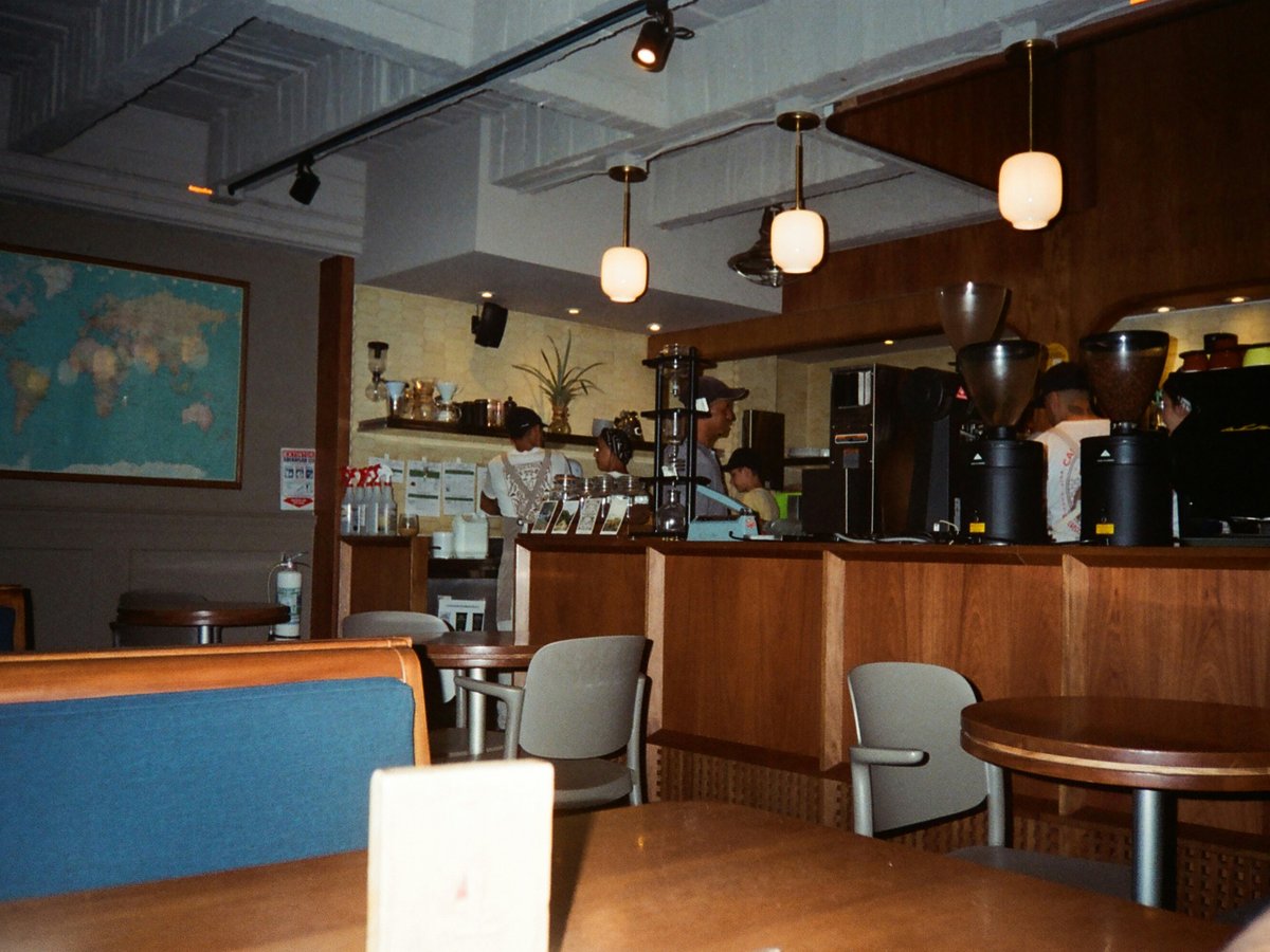 Interior of a cozy coffee shop with wooden accents.