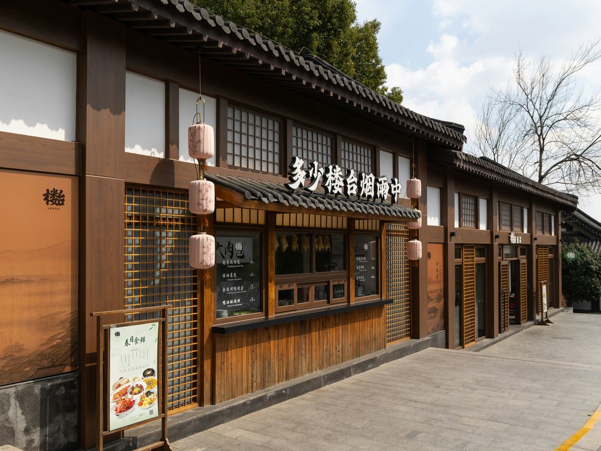 Traditional chinese building with lanterns in the daylight
