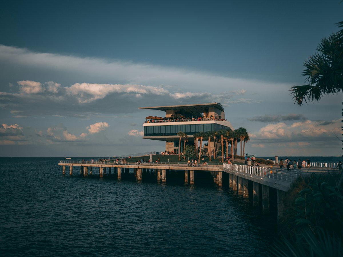 a pier with a building on top of it
