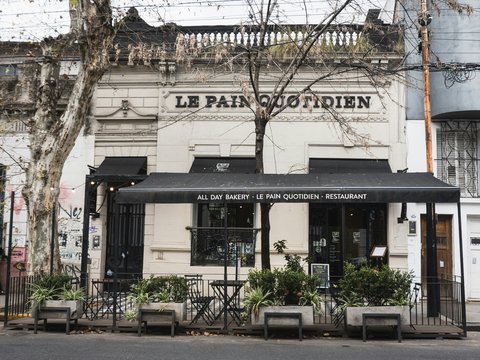 Le pain quotidien bakery storefront on a street.