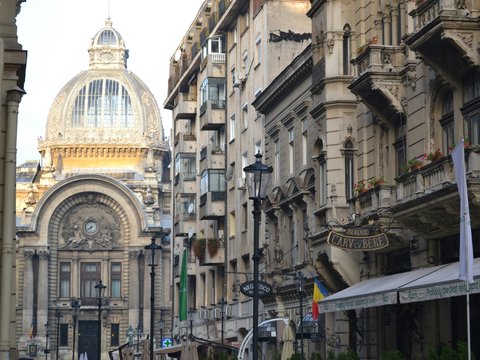 a city street filled with lots of tall buildings