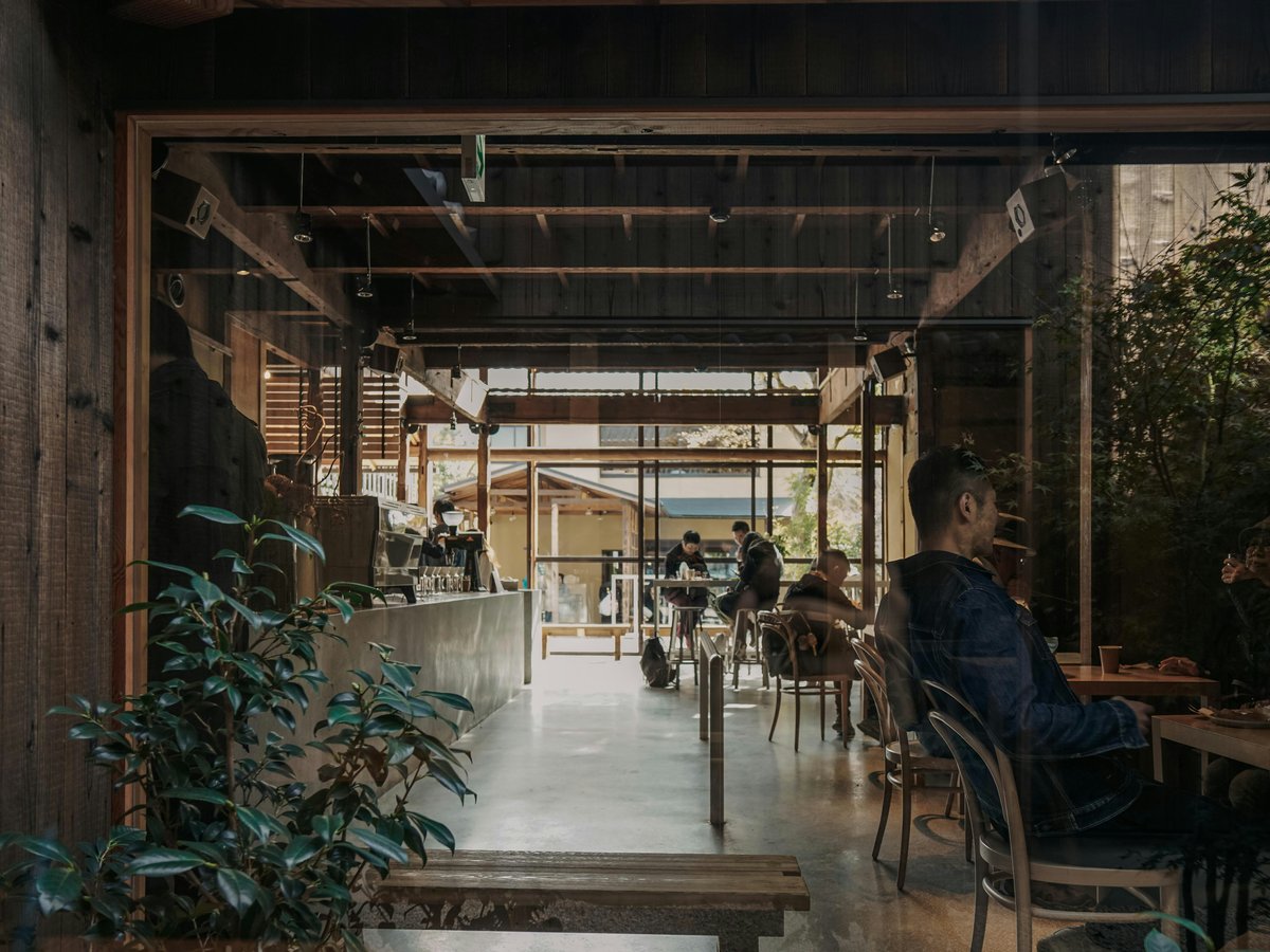 a group of people sitting at tables