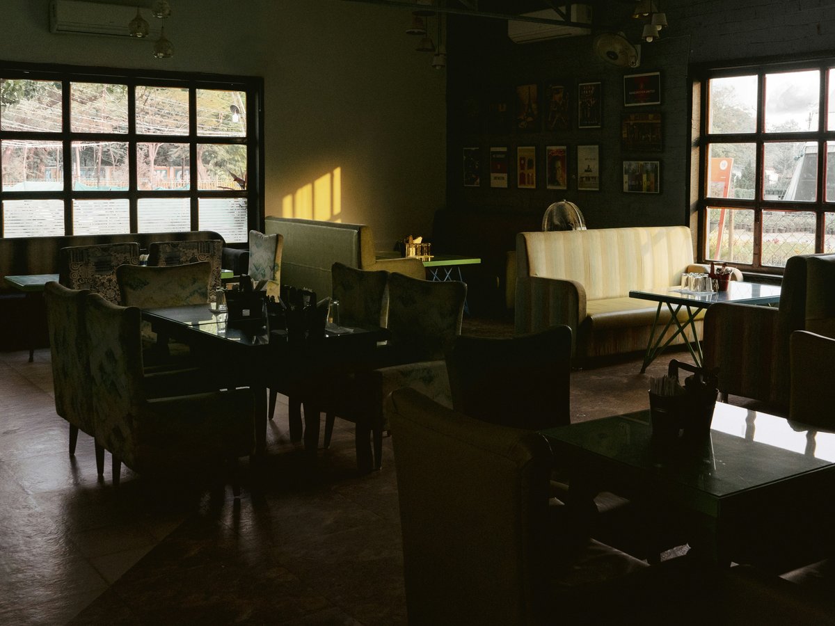 a room with tables and chairs