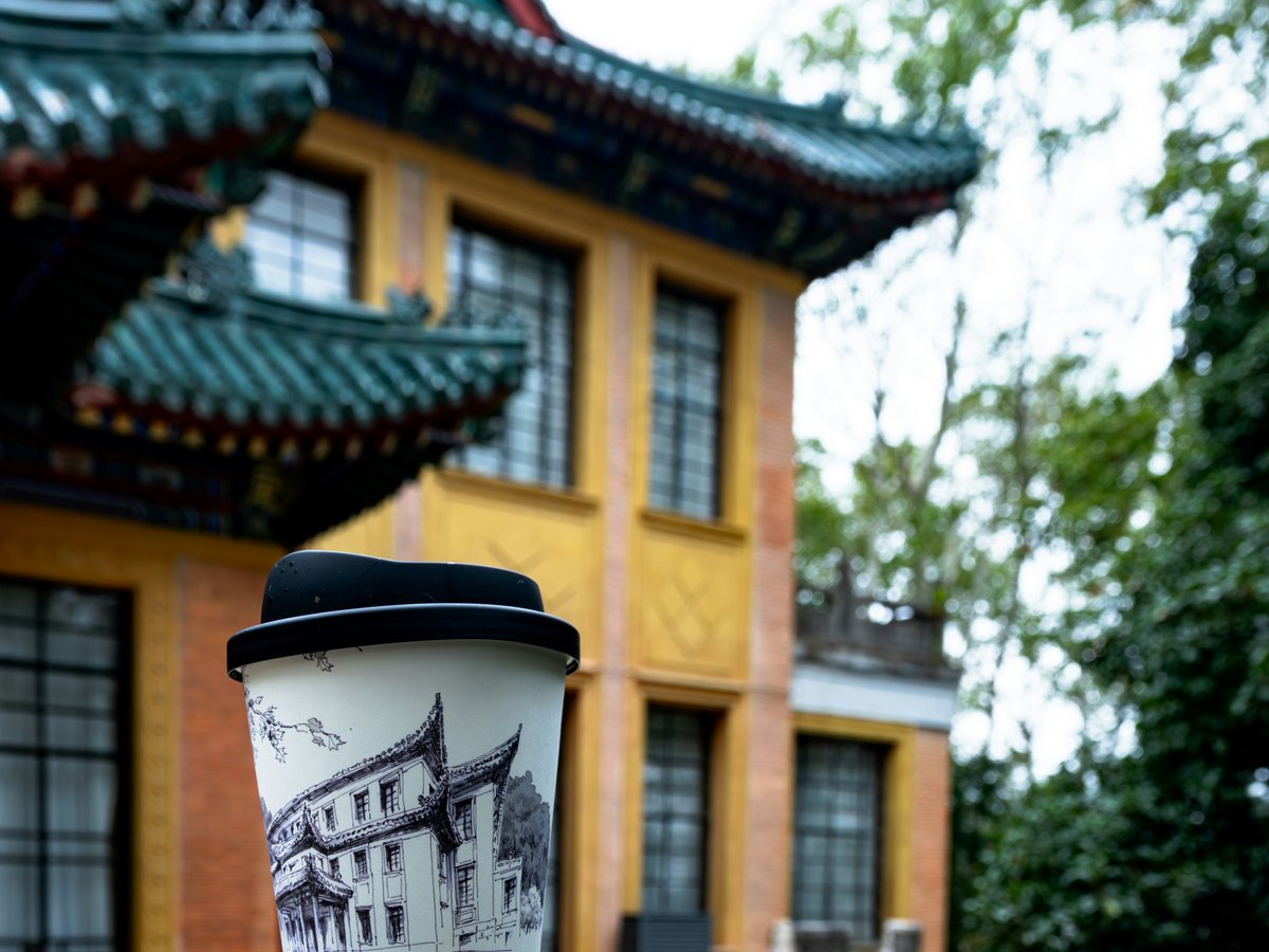 A cup of coffee sitting on top of a building