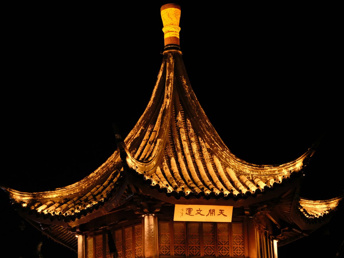 a tall tower with a clock on top of it