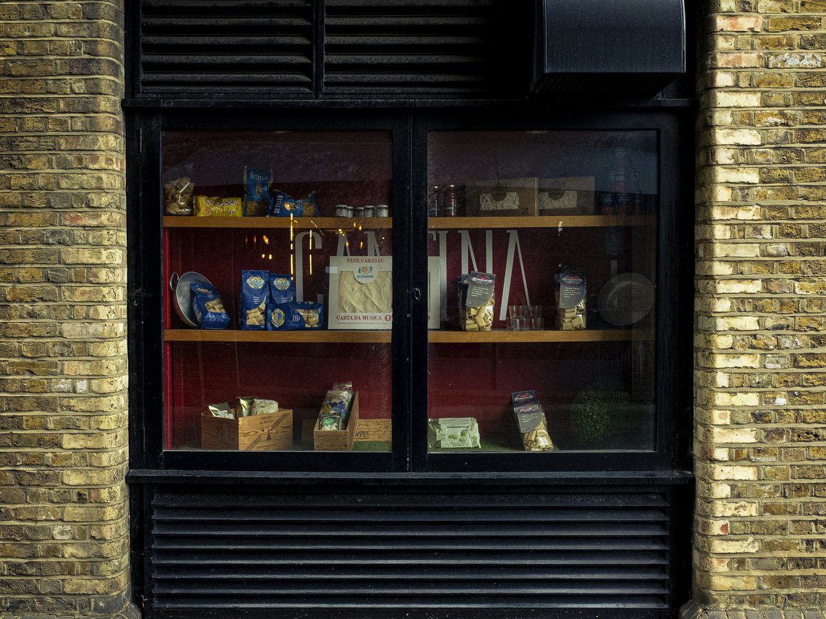 brown wooden framed glass window