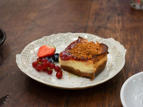 sliced bread with strawberry on white ceramic plate