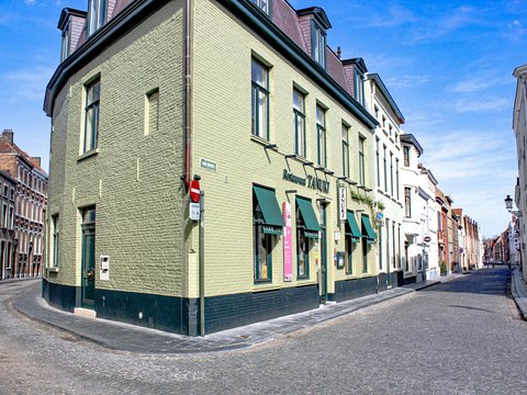 green 3-storey building