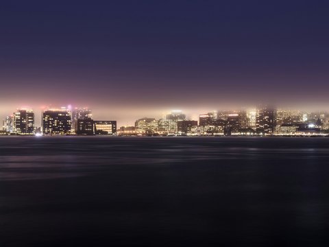 cityscape by water