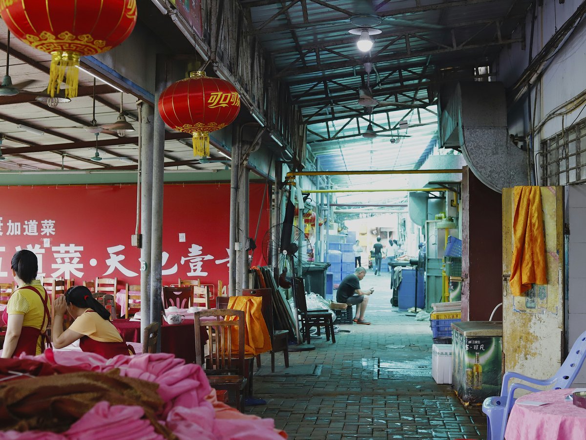 two red Chinese lanterns hanging on ceiling