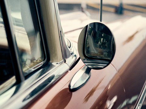 a side view mirror on the side of a car