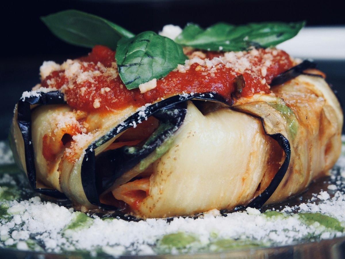 baked food with cream with on top close-up photography