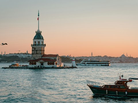 a boat floating on top of a body of water