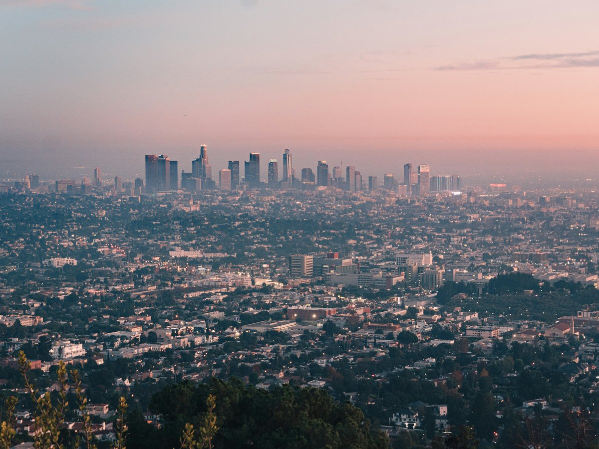 A view of the city of los angeles from the top of a hill