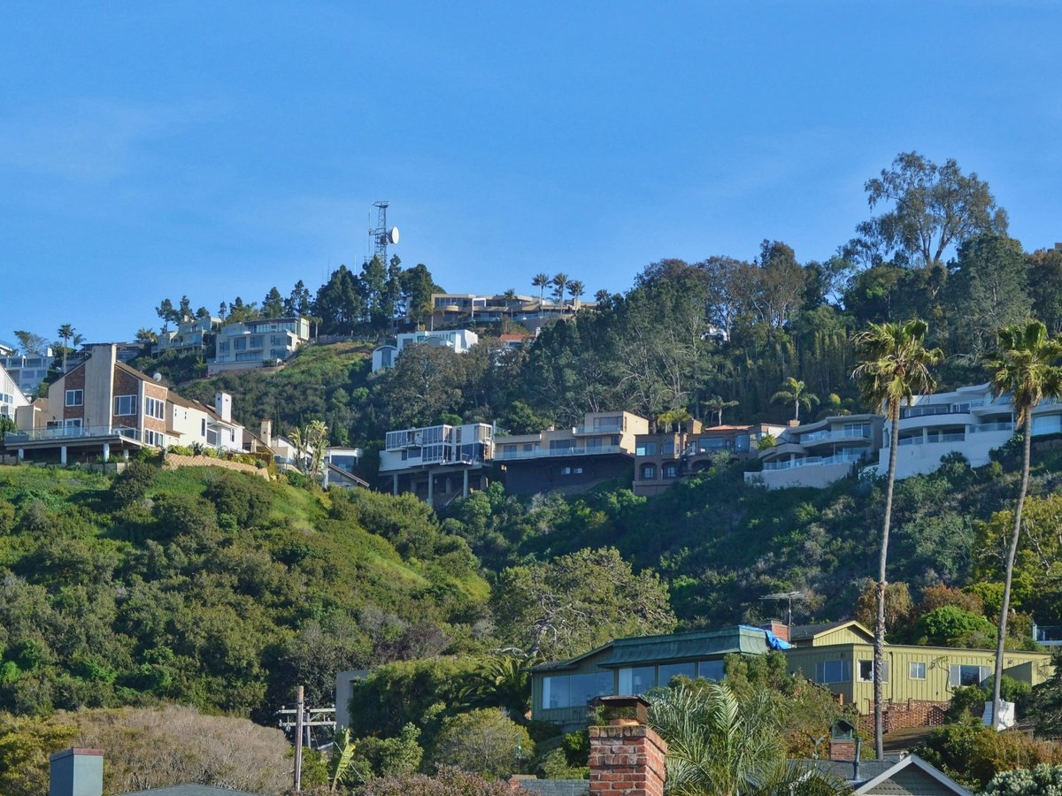 a hill with houses on top of it