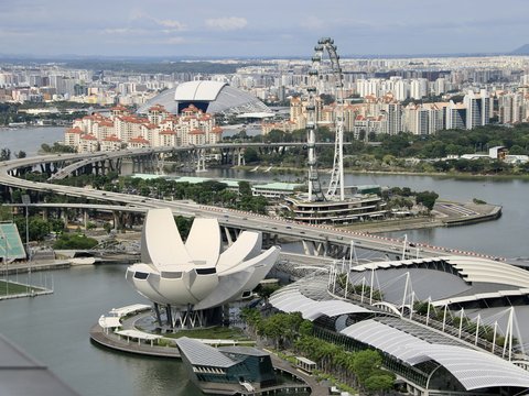 an aerial view of a city and a bridge