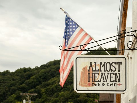 a sign with a flag on it