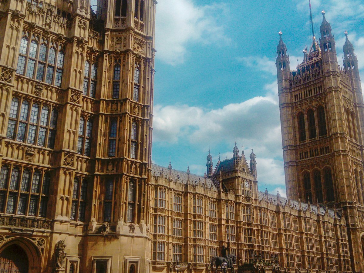 the big ben clock tower towering over the city of london