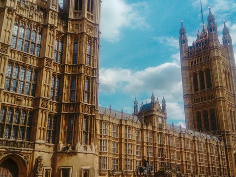 the big ben clock tower towering over the city of london