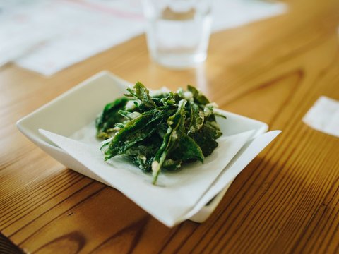 green vegetable on white ceramic plate