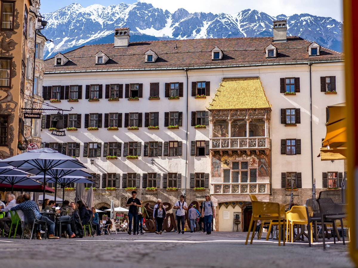 people walking on street near buildings during daytime