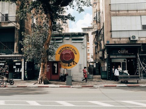 person walking in the street during daytime
