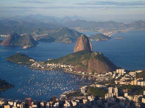 Sugarloaf mountain towers over rio de janeiro.