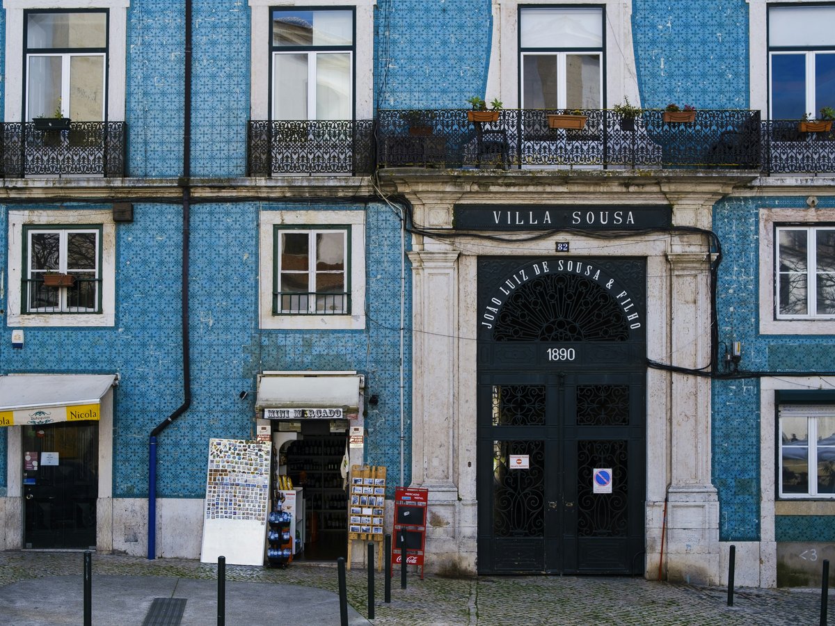 blue and white concrete building during daytime