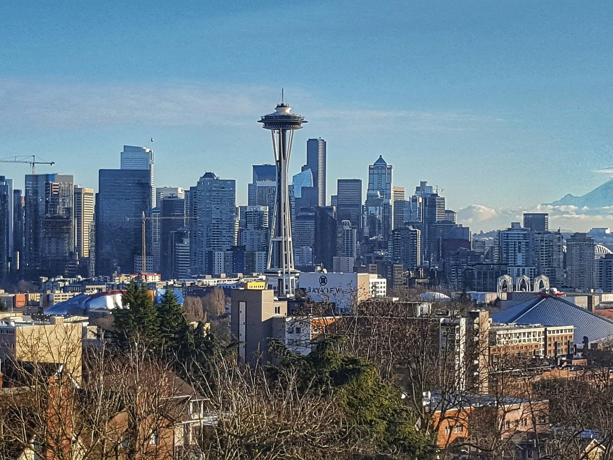city skyline under blue sky during daytime