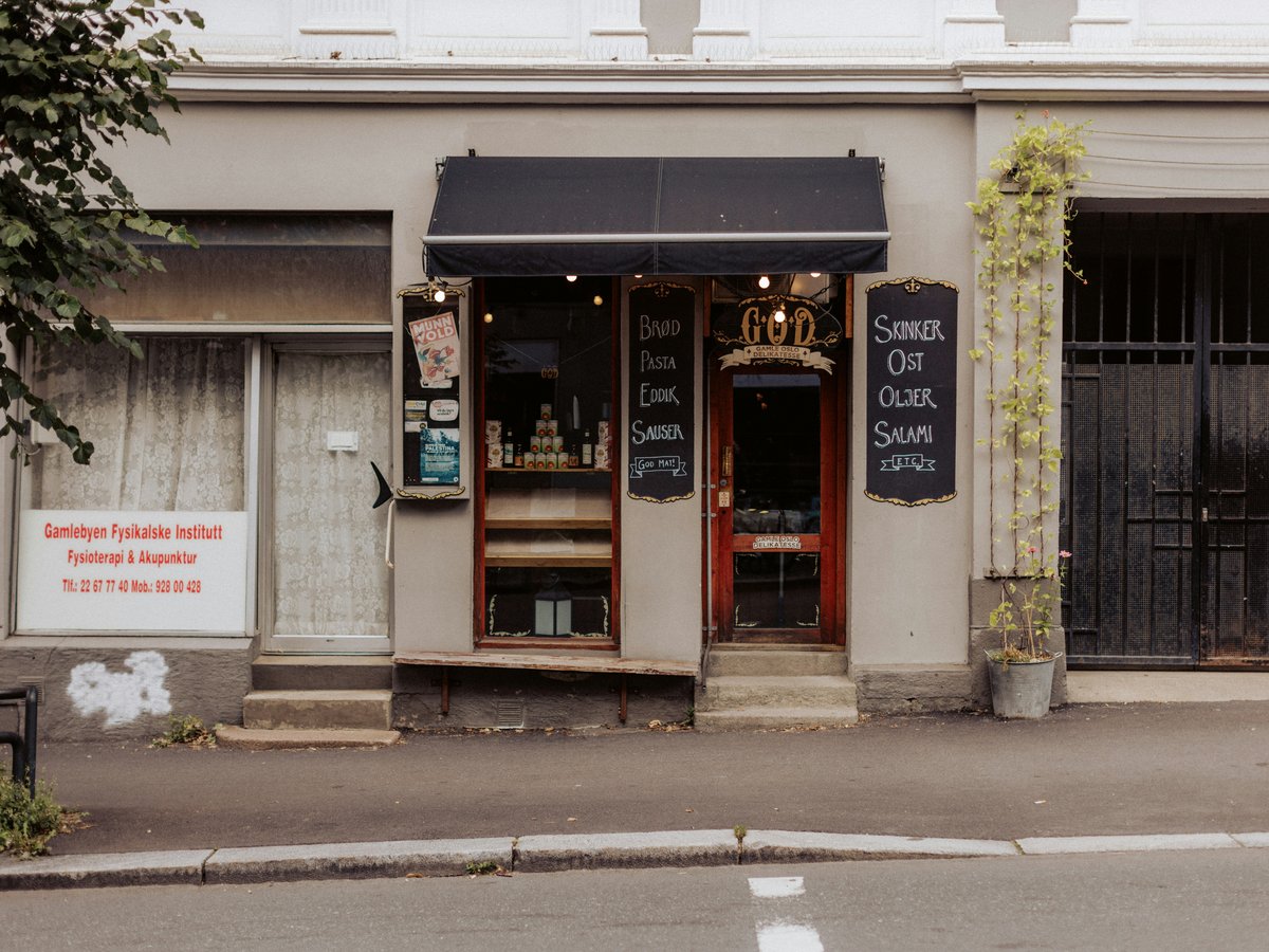 A store front with a sign on the front of it