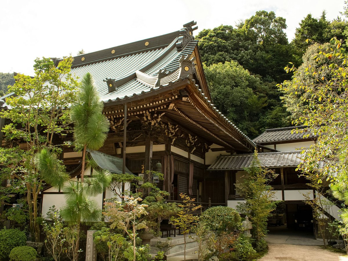 a building with trees around it