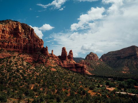 brown rock formation under blue sky during daytime