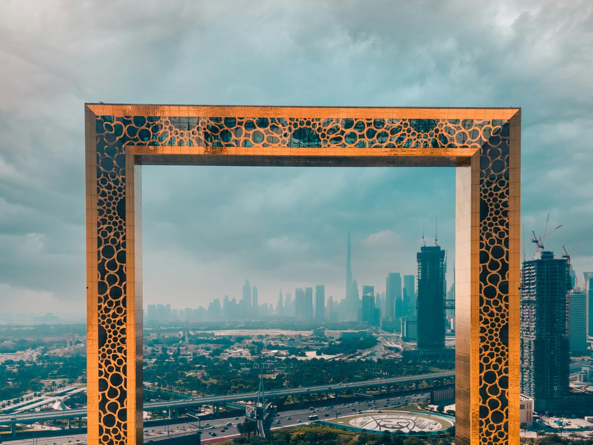 a picture frame in the middle of a city