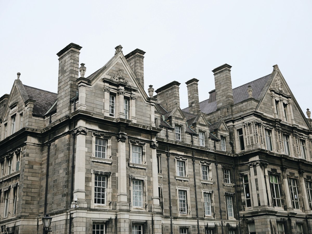gray concrete multi-story building during daytime