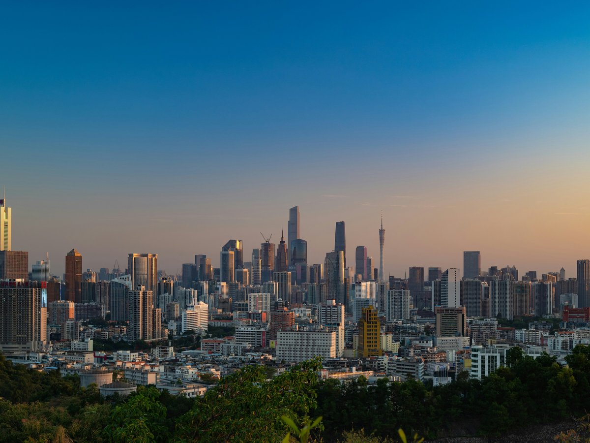 a view of a city from a hill