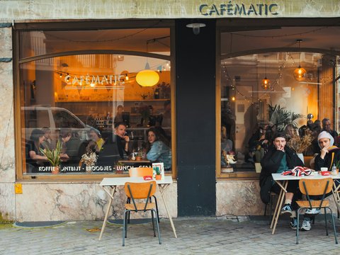 people sitting inside cafe
