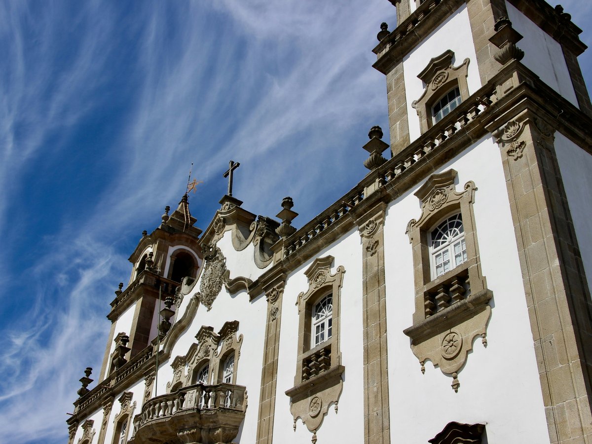 white and brown concrete church during daytime