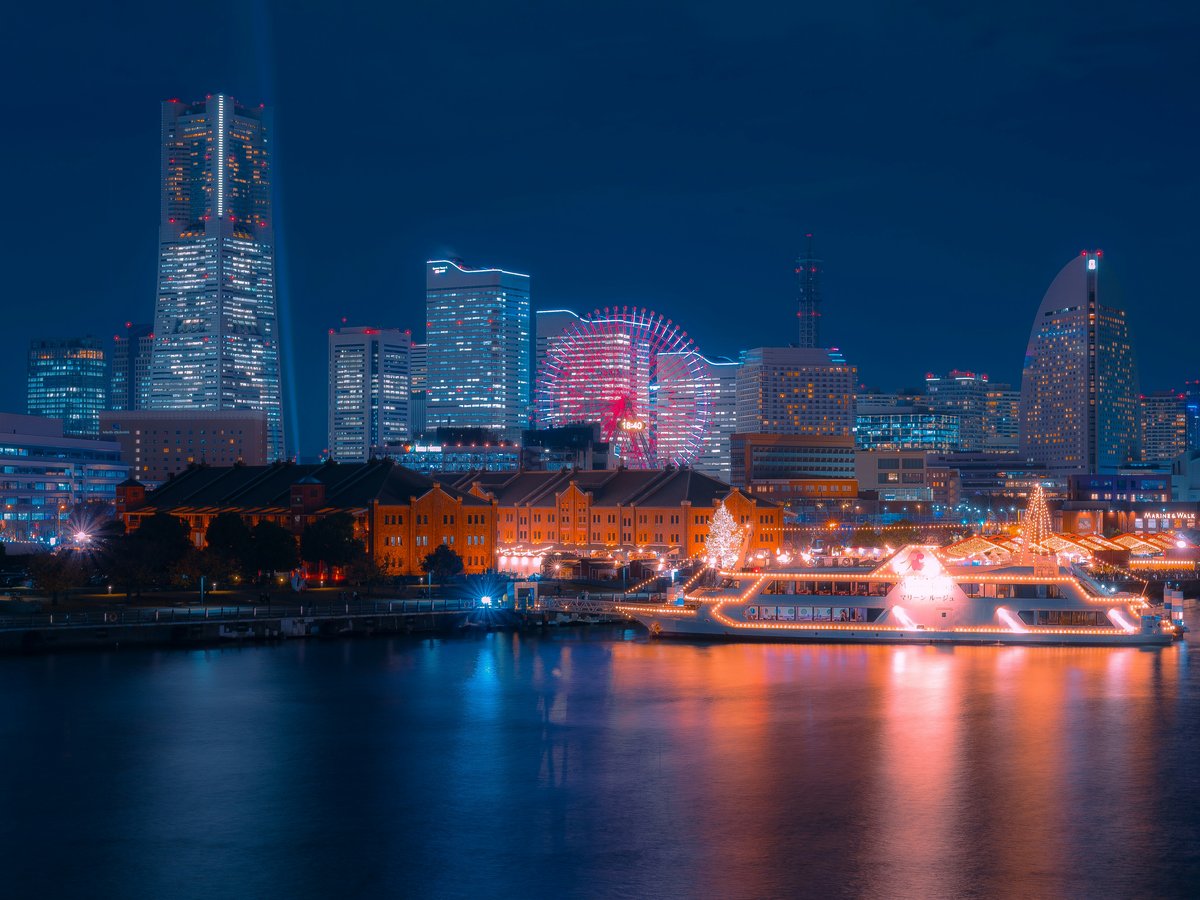 a view of a city at night from across the water