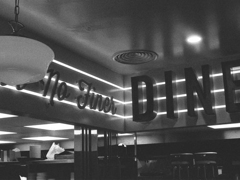 A black and white photo of a diner