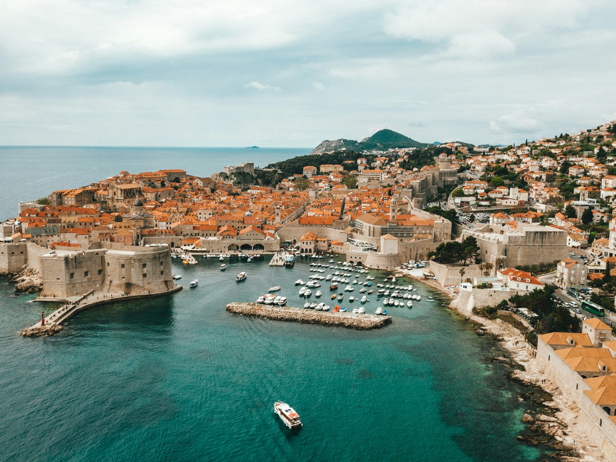 aerial view of buildings near ocean