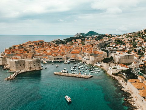 aerial view of buildings near ocean