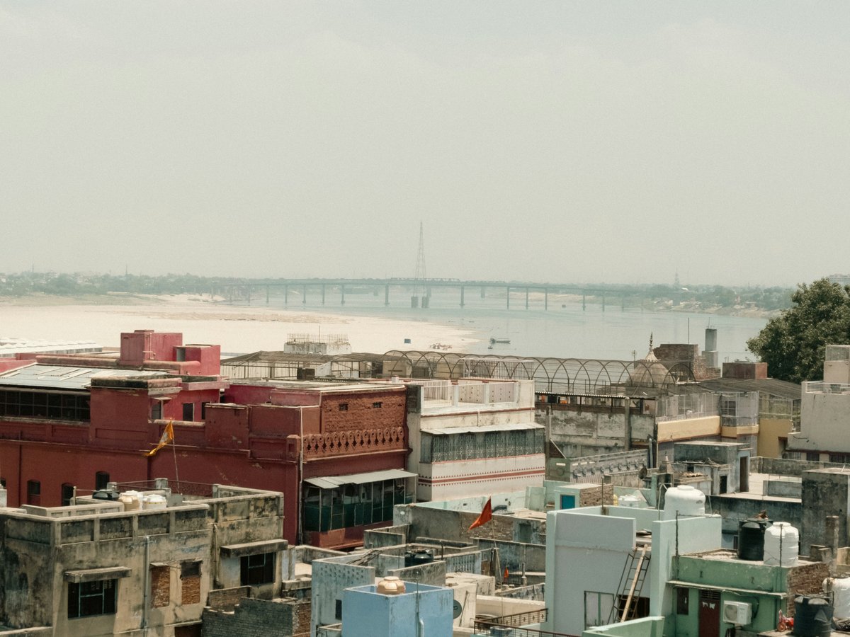 a view of a city with a bridge in the distance