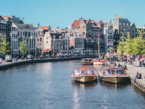 boats on the river near the building