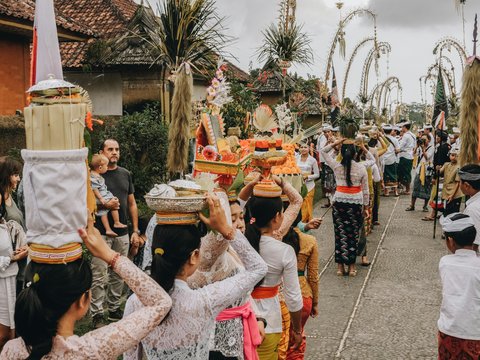 group of people parade on street