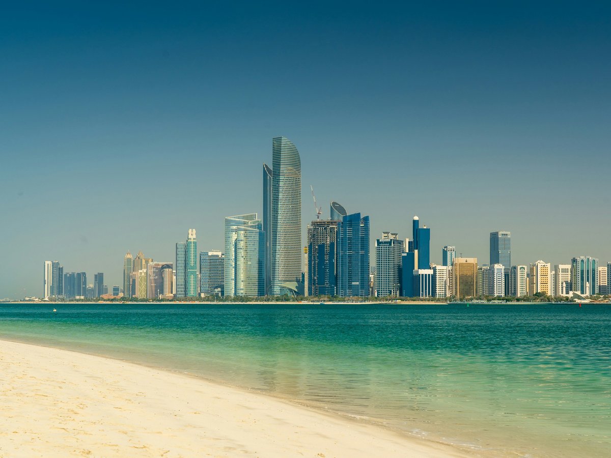 city skyline across the sea during daytime