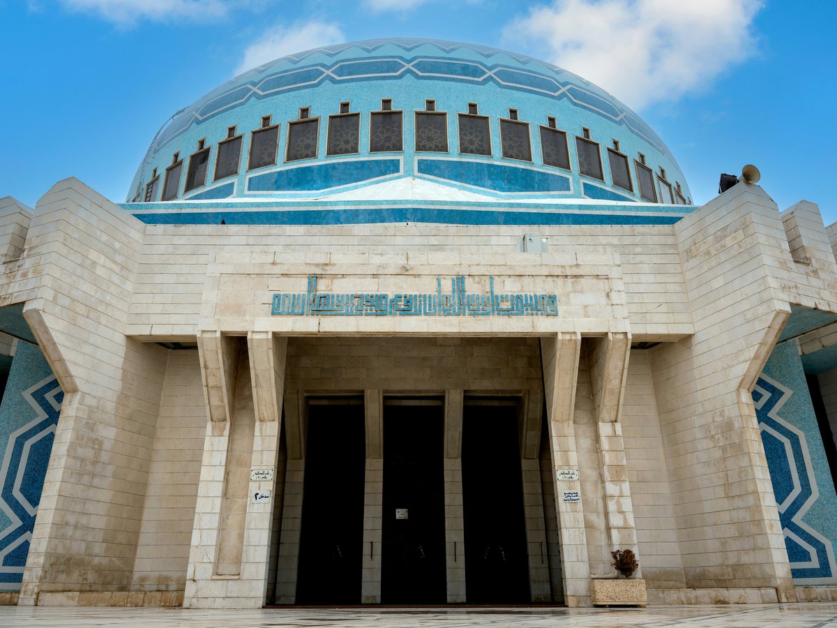 a large building with a blue dome on top of it