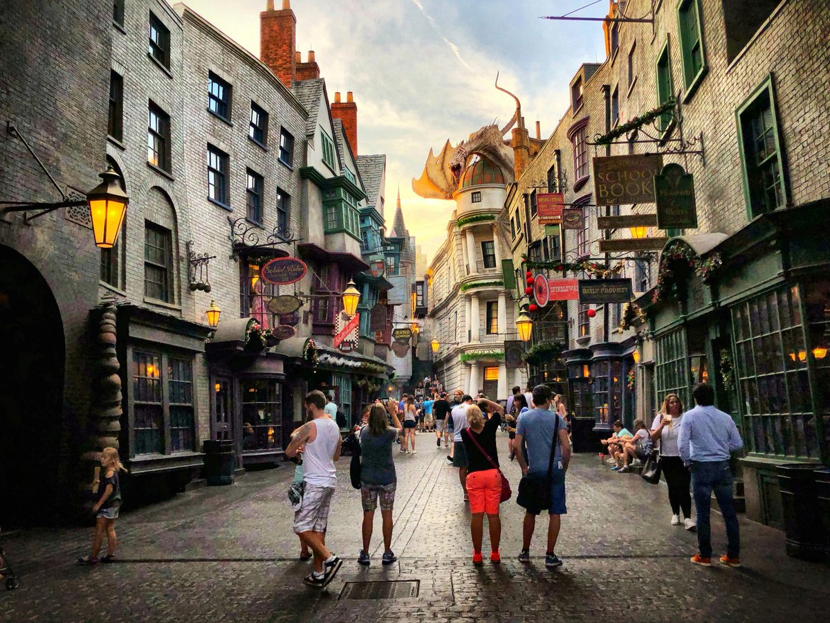 people standing and walking near buildings